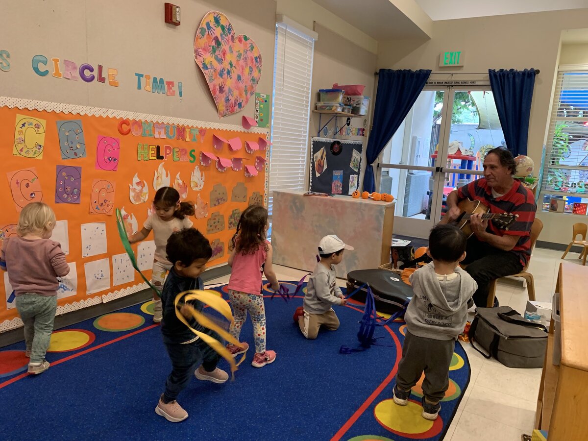 Children learning instruments in enrichment music class