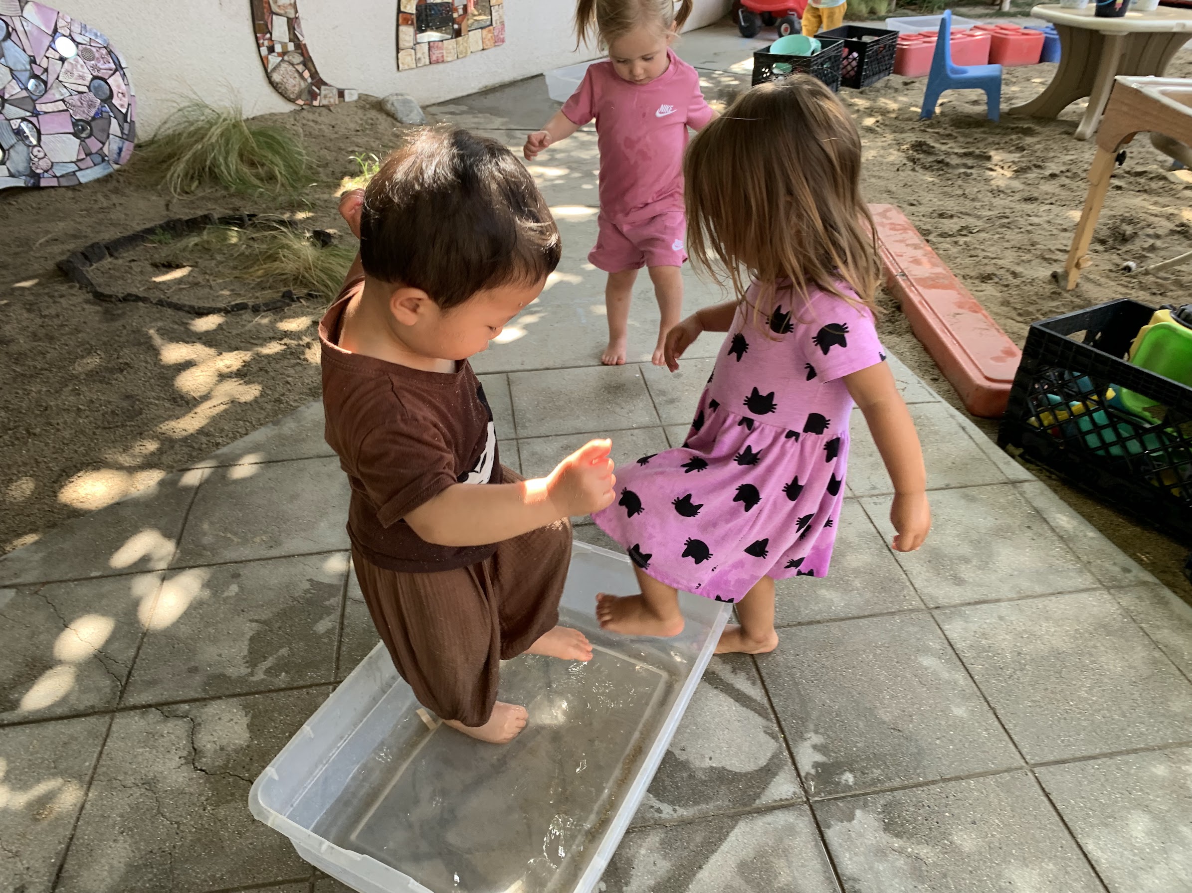 Children engaged in outdoor discovery at UPNS